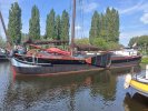 Klipperaak met vaste ligplaats Almere Woonboot foto: 0